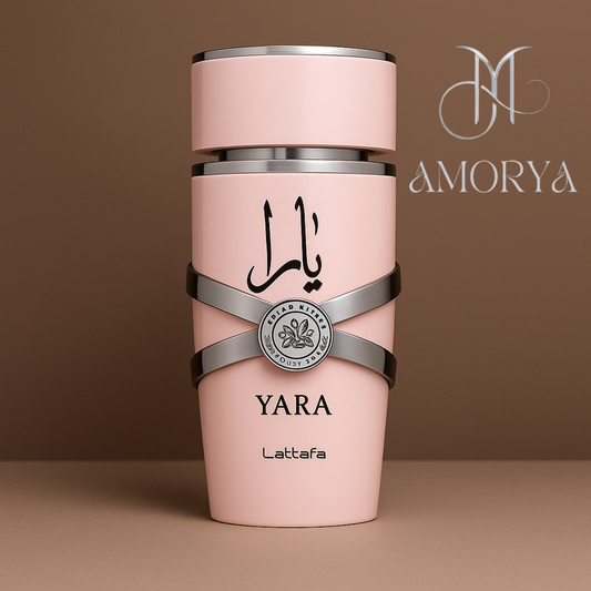 Elegant bottle of Yara by Lattafa Eau de Parfum for women, featuring Amorya’s signature logo, set against a taupe background with silver accents